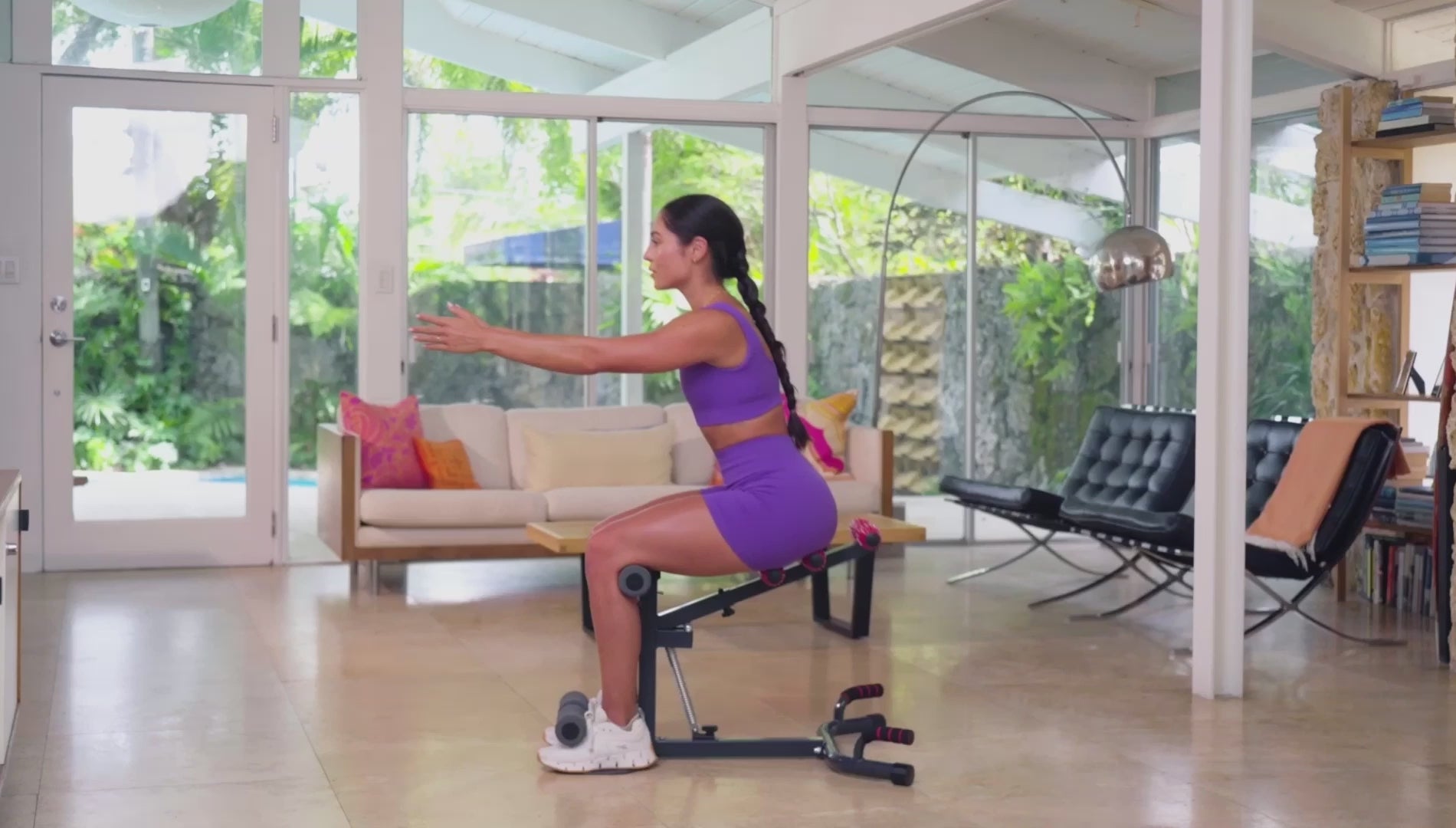 Load video: Women use machine Maxi Squat for exercise