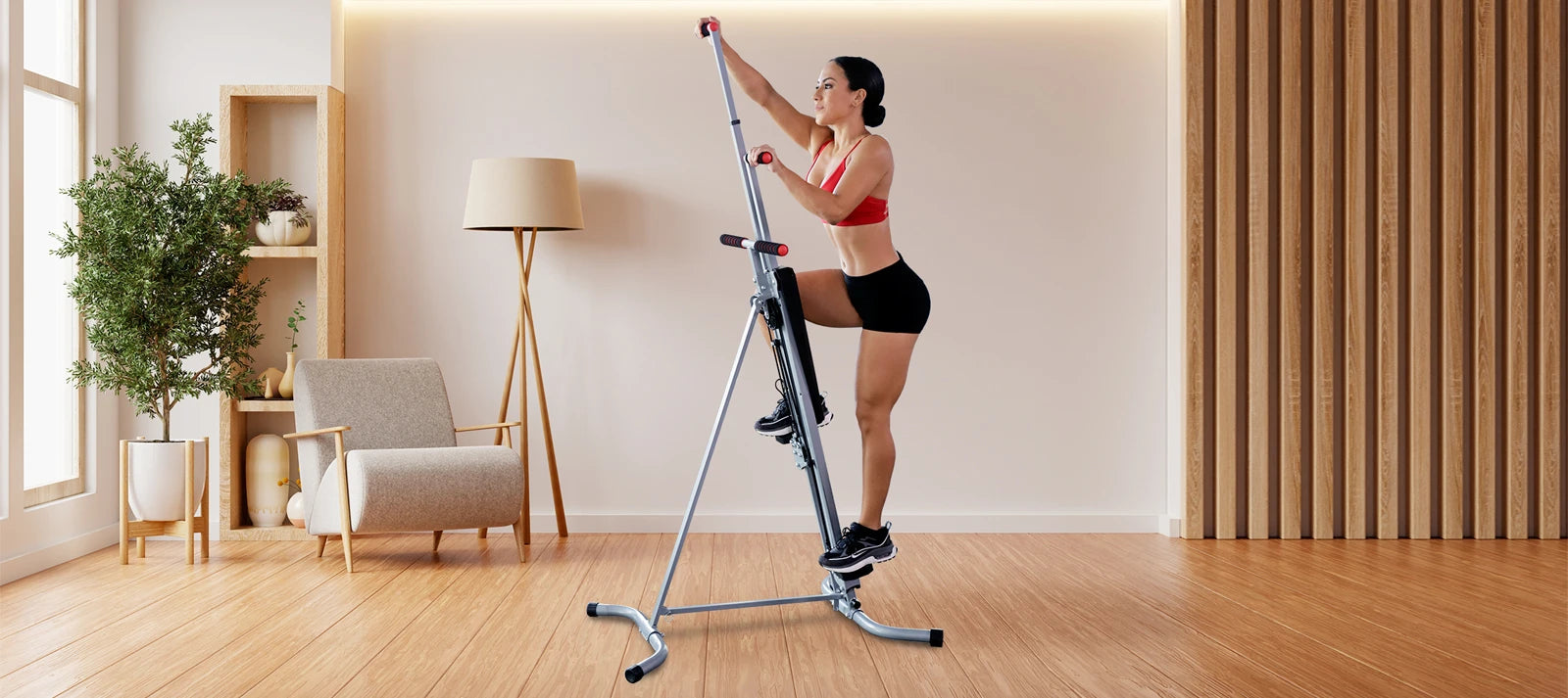 MaxiClimber 2.0  vertical climber now features Elastic Resistance System / Fit model wearing red top and black shorts working out on the MaxiClimber 2.0